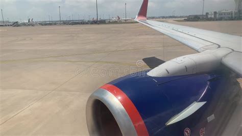 Aircraft S Wing And Land Seen Through The Illuminator Stock Footage