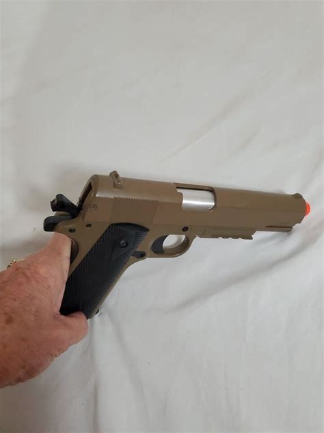 Cybergun Colt M A Airsoft Spring Pistol With Metal Slide Tan Ebay