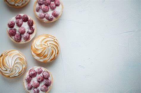 Premium Photo Delicious Lemon And Raspberry Tartlets