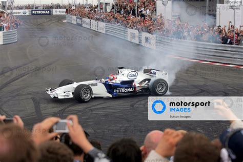 Canadian Grand Prix winner Robert Kubica (POL) demonstrates a BMW ...