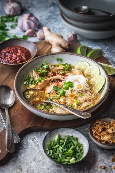 Gingery Chicken And Rice Noodle Soup With Crispy Garlic