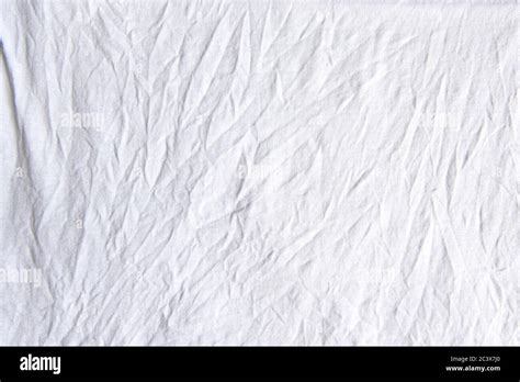 Wrinkled crumpled white cloth, background or texture Stock Photo - Alamy