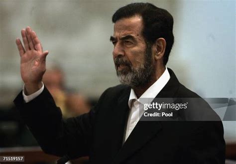 Saddam Hussein Returns To Court In Baghdad Photos And Premium High Res Pictures Getty Images