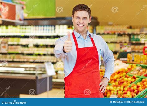 Store Manager Holding Thumbs Up Stock Photo - Image: 44368603