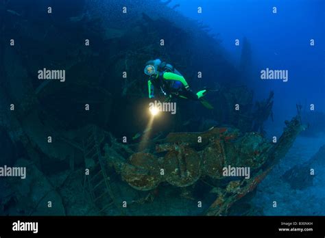 Diver At Torpedo Tubes At Destroyer Uss Anderson Marshall Islands Bikini Atoll Micronesia