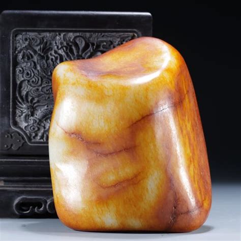 A Hetian Jade Raw Seed Ornament A Hetian Jade Raw Seed Ornament A