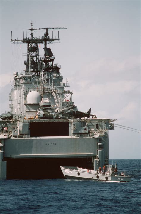 An LCM 8 Mechanized Landing Craft Backs Out Of The Well Deck Of The