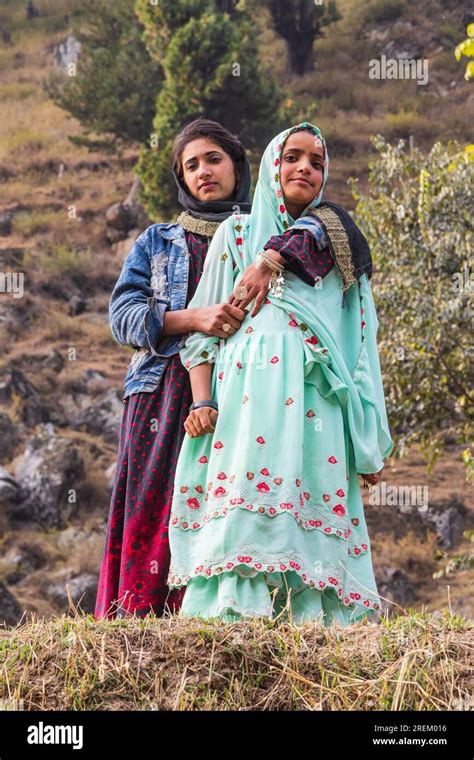 Kangan, Jammu and Kashmir, India. October 27, 2022. Two women in a ...