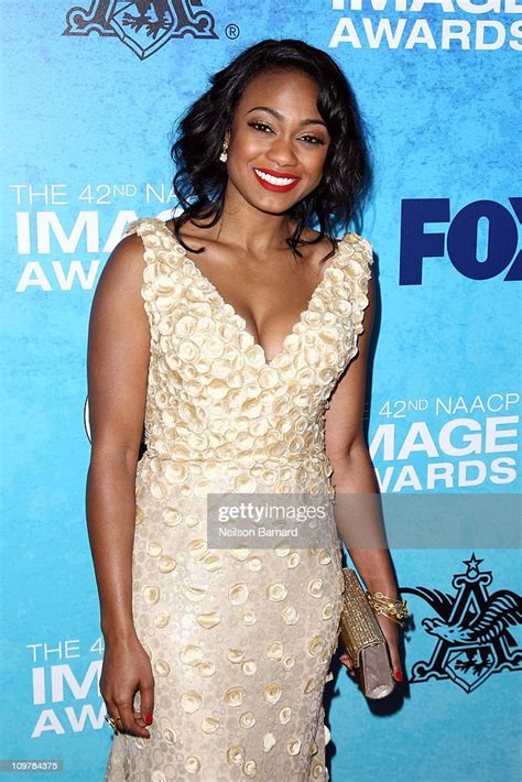 Actress Tatyana Ali Arrives At The 42nd Naacp Image Awards After