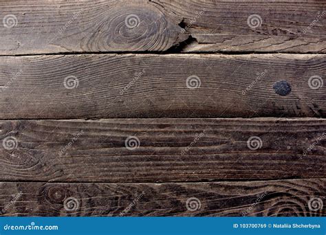 Aged Dark Brown Wooden Boards Planks With Metal Nails As Grunge Wooden