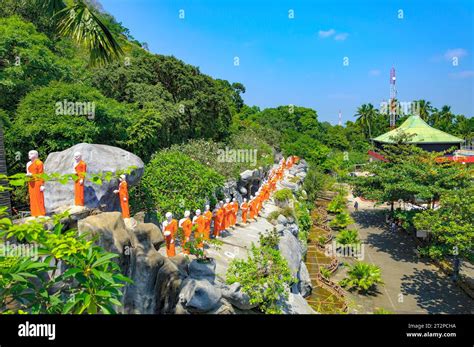 Statues Of Monks Standing In Line For Worshiping The Buddha The Golden