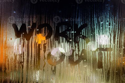 The Words Work Out Written On Night Wet Window Glass Close Up With