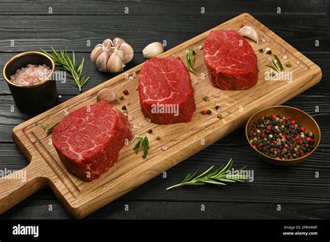 Close Up Raw Beef Tenderloin Steak On Board Stock Photo Alamy