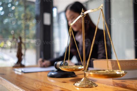 Brass Scales Are Placed On Lawyers Desks In Legal Advice Offices As A