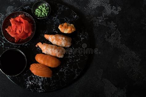 Close Up Of Sashimi Sushi Set On Black Background Stock Photo Image