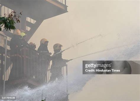 12 Massive Fire Breaks Out In Metro House Building In Mumbai Stock