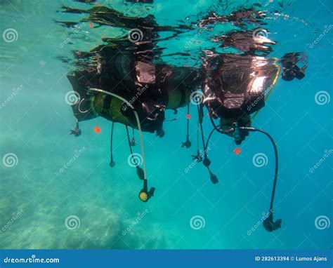 Buoyancy Control Device Bc And Diving Tubes In Water Stock Photo