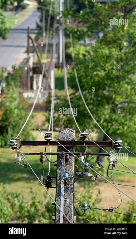 Electrical Network Pole With Electric Wires Electric Wires On With Insulators On The Pole