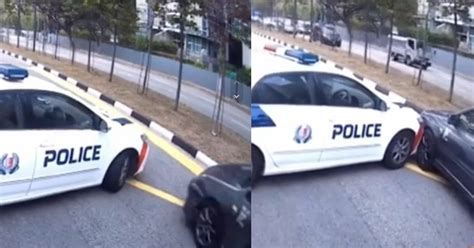 Video of police car & black car both reversing & proceeding to crash ...