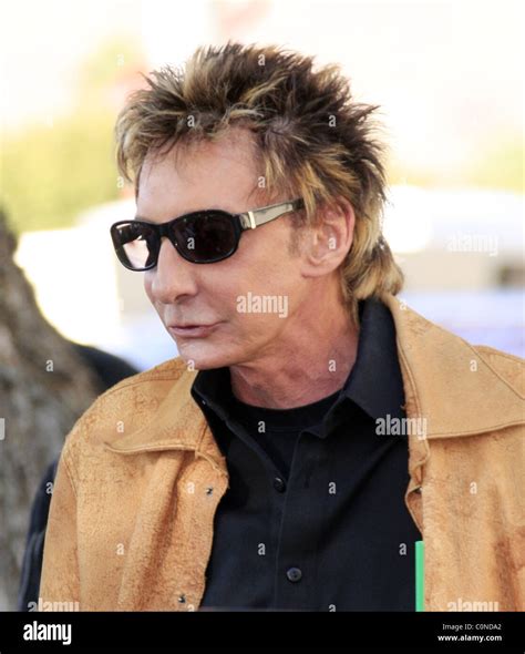 Barry Manilow goes for an iced coffee in Palm Springs California, USA ...