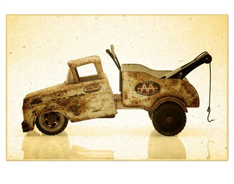 Antique toy tow truck Photograph by Bill Krzyzanowski | Fine Art America