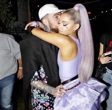 Ariana Grande Giving Her Boyfriend Mac Miller A Big Tight Hug With Her Eyes Closed Ariana