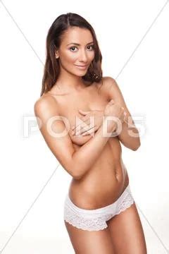 Beautiful Woman Covering Her Breasts Stock Photo