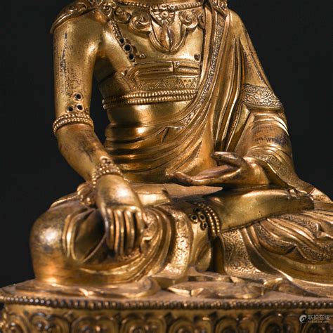 Bidlive A Tibetan Bronze Gilt Figure Of Crown Buddha