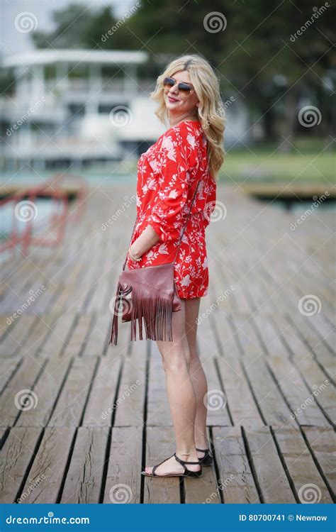Blonde Woman On The Deck At Lake Stock Image Image Of Four Fashion 80700741