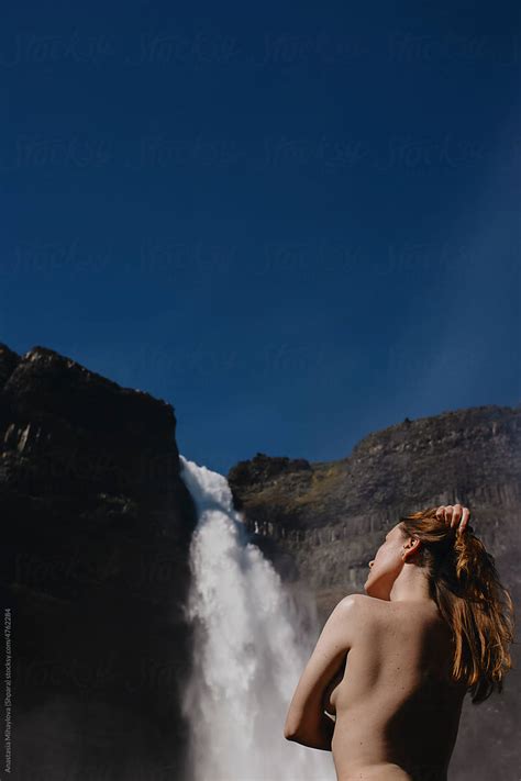 Nude Woman In Nature Near The Waterfall By Stocksy Contributor Anastasia Mihaylova Shpara