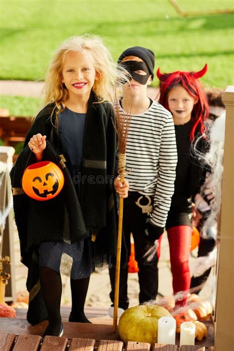 Boy Trick Or Treating With Friends Stock Image Image Of Curly