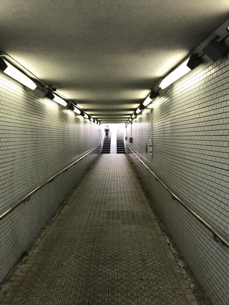 Premium Photo Illuminated Underground Walkway