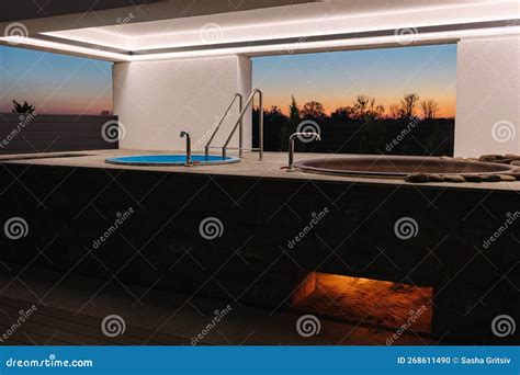 Modern Big Hot Tub Outdoor In Sunset Bonfire Under Tube Warming Water Relaxation On Holidays