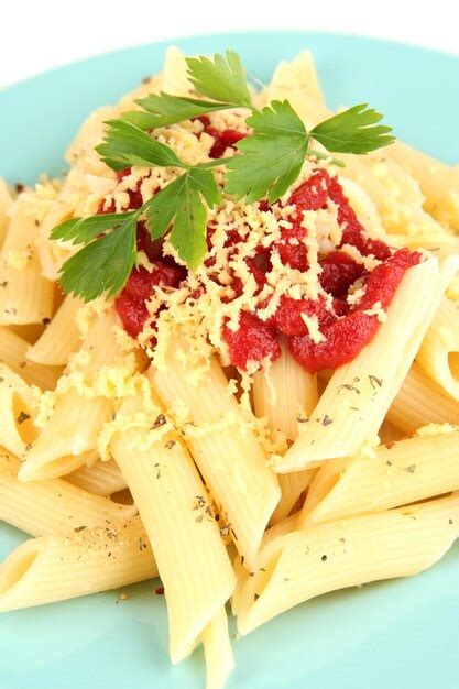 Premium Photo Rigatoni Pasta Dish With Tomato Sauce Close Up