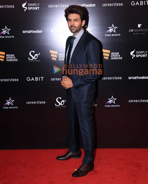 Photos Kartik Aaryan Karan Johar Neha Dhupia And Others Grace The Red