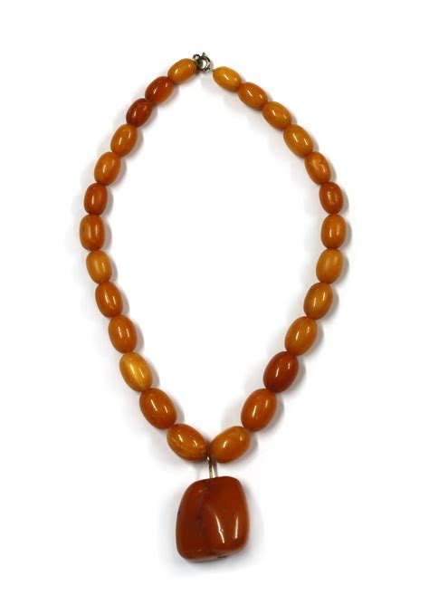 Bid Now A Single Row Graduated Butterscotch Amber Bead Necklace