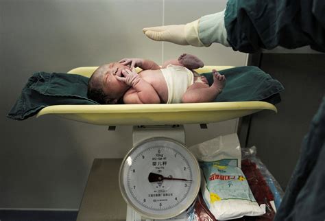 Many hospitals in China stop newborn delivery services as birth rate drops | Reuters