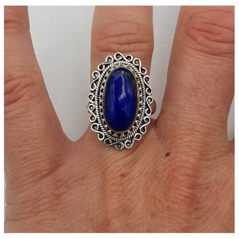 Zilveren Ring Met Ovale Lapis Lazuli En Bewerkte Kop Mm Ring Maat