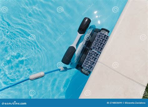 Robot Vacuum Cleaner for the Pool Cleans the Outdoor Pool Stock Image ...