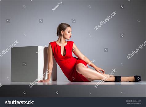 Beautiful Blonde Woman Sitting Red Dress Stock Photo 250644661 Shutterstock