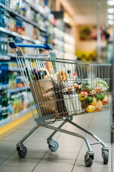 Empty Shopping Cart In Supermarket Stock Photo Arturverkhovetskiy