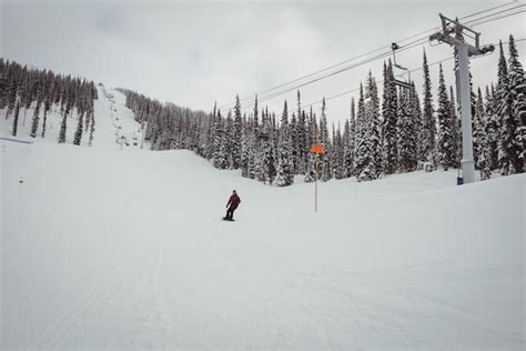 Free Photo | Man skiing on snowy alps in ski resort