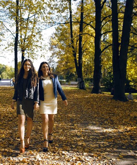 Mature Real Mother With Daughter Outside Autumn Fall In Park Stock
