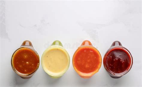 Various Sauces Marinades And Dressings In Small Bowls In A Row White Background Ai Generated