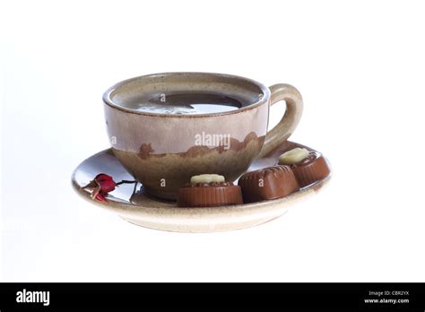 Chocolate Pralines Cup With Black Coffee On White Background Delicious