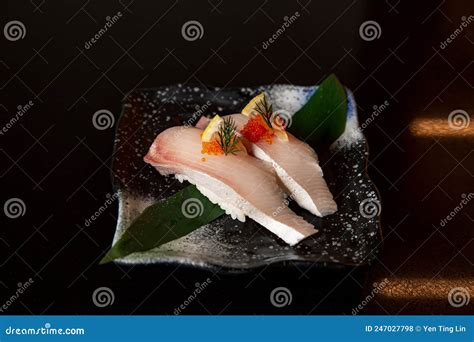 Kingfish Sushi With Tobiko Flying Fish Roe In The Fine Dining Japanese