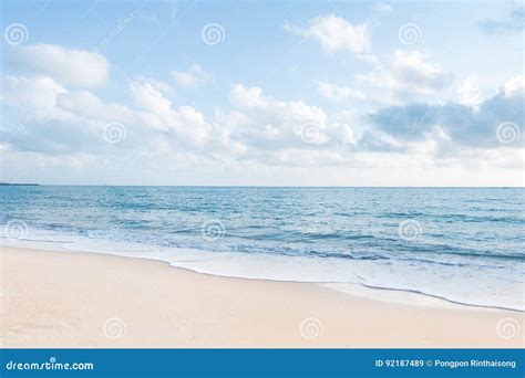 Beautiful White Sand Beach And Ocean Waves With Clear Blue Sky Stock