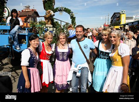 Oktoberfest, young women with traditional Dirndl, Munich, Bavaria ...