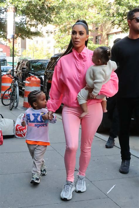 Kim Kardashian spotted out and about with her kids wearing an all pink outfit in New York City