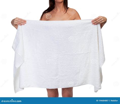 Woman Holding A White Towel And Covering Herself Isolated On White Background Stock Image